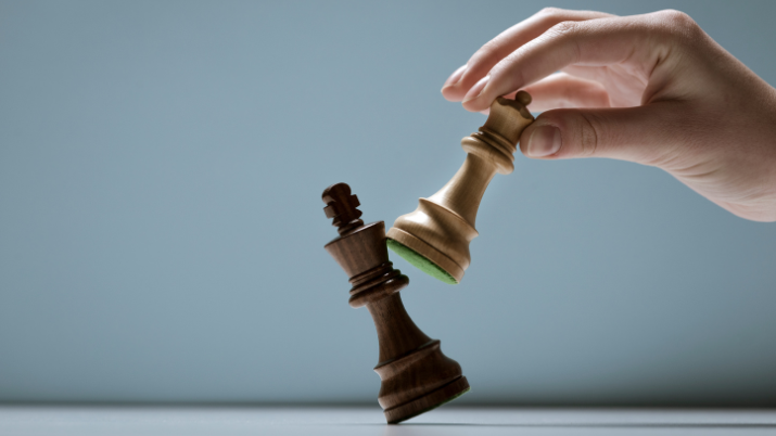 Player defeating his opponent and winning at chess