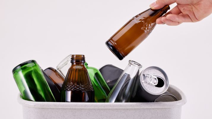Image: Glass bottles in a recycling container